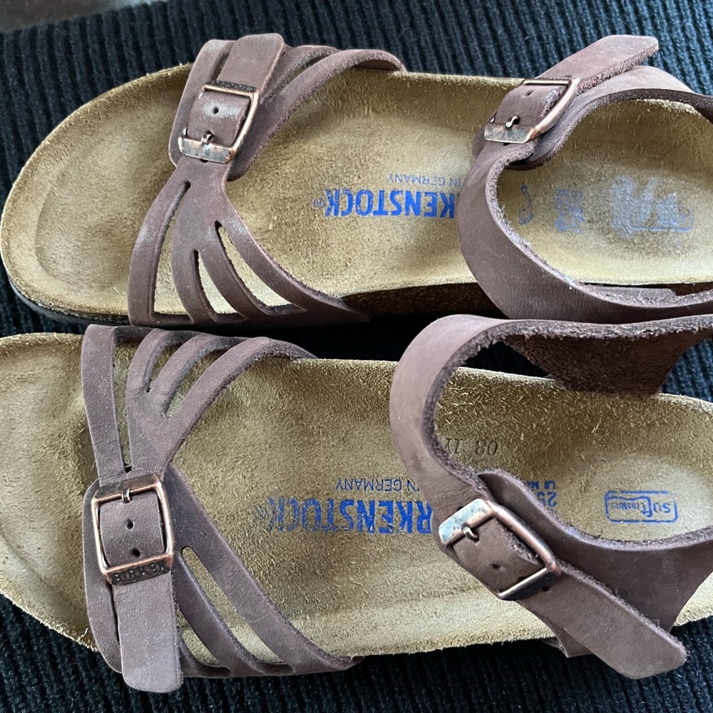 Brand new without box. I tried it on in the store & they just don’t fit.